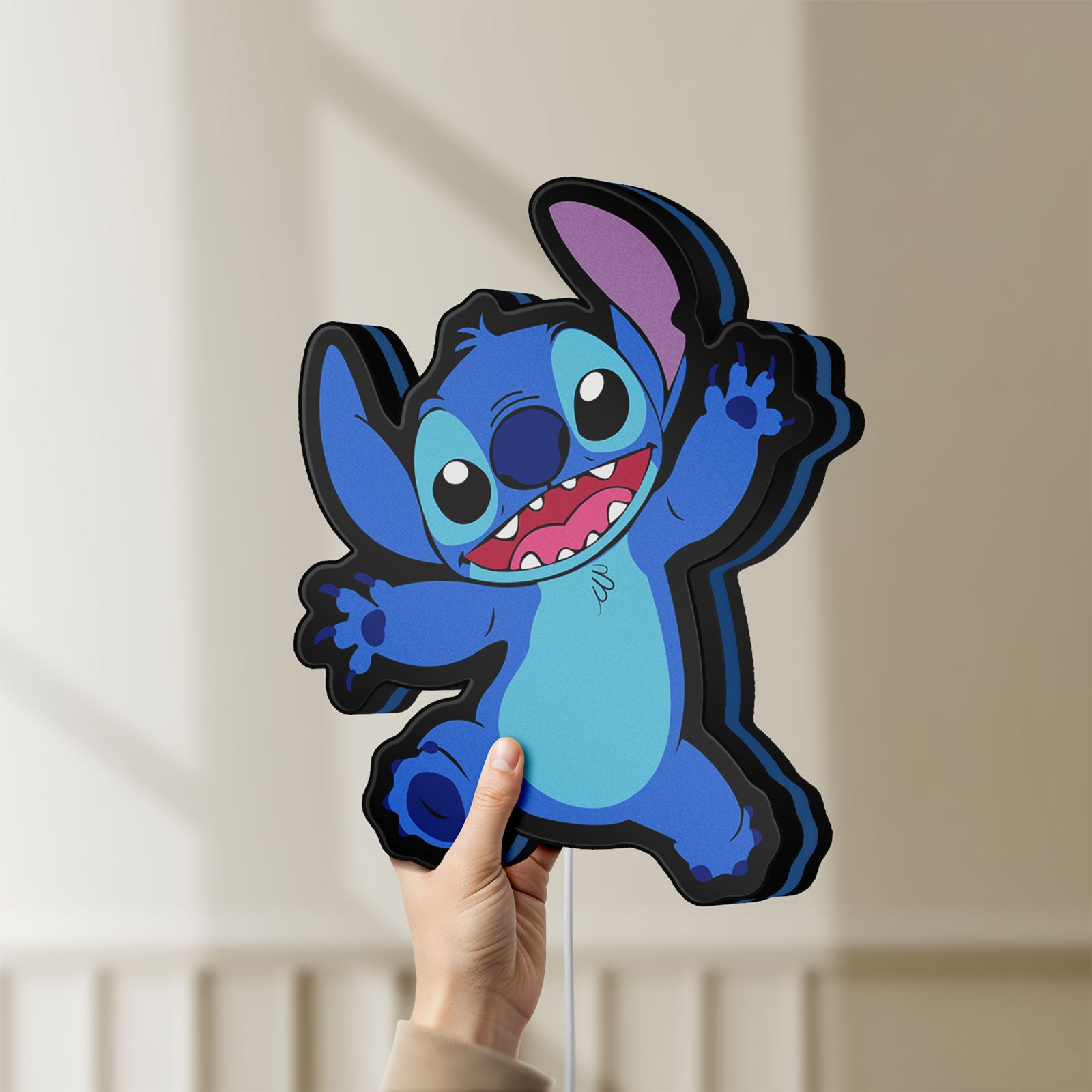 Unlit Stitch Happy LED lightbox held by hand to show size and details