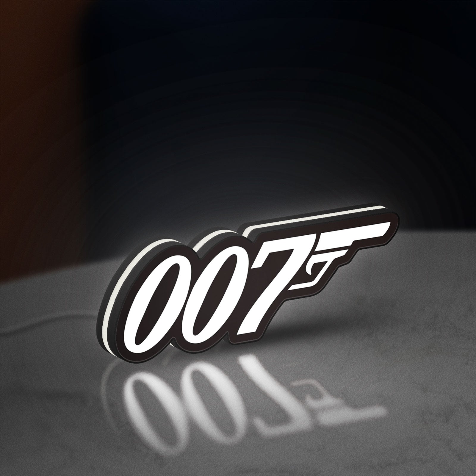 James Bond 007 LED lightbox standing on a desk from an angled side view with white glow