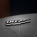 James Bond 007 LED lightbox lying flat on a desk with white glow
