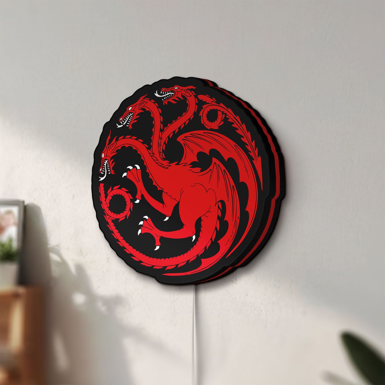 Unlit House Targaryen LED lightbox mounted on a wall in daylight