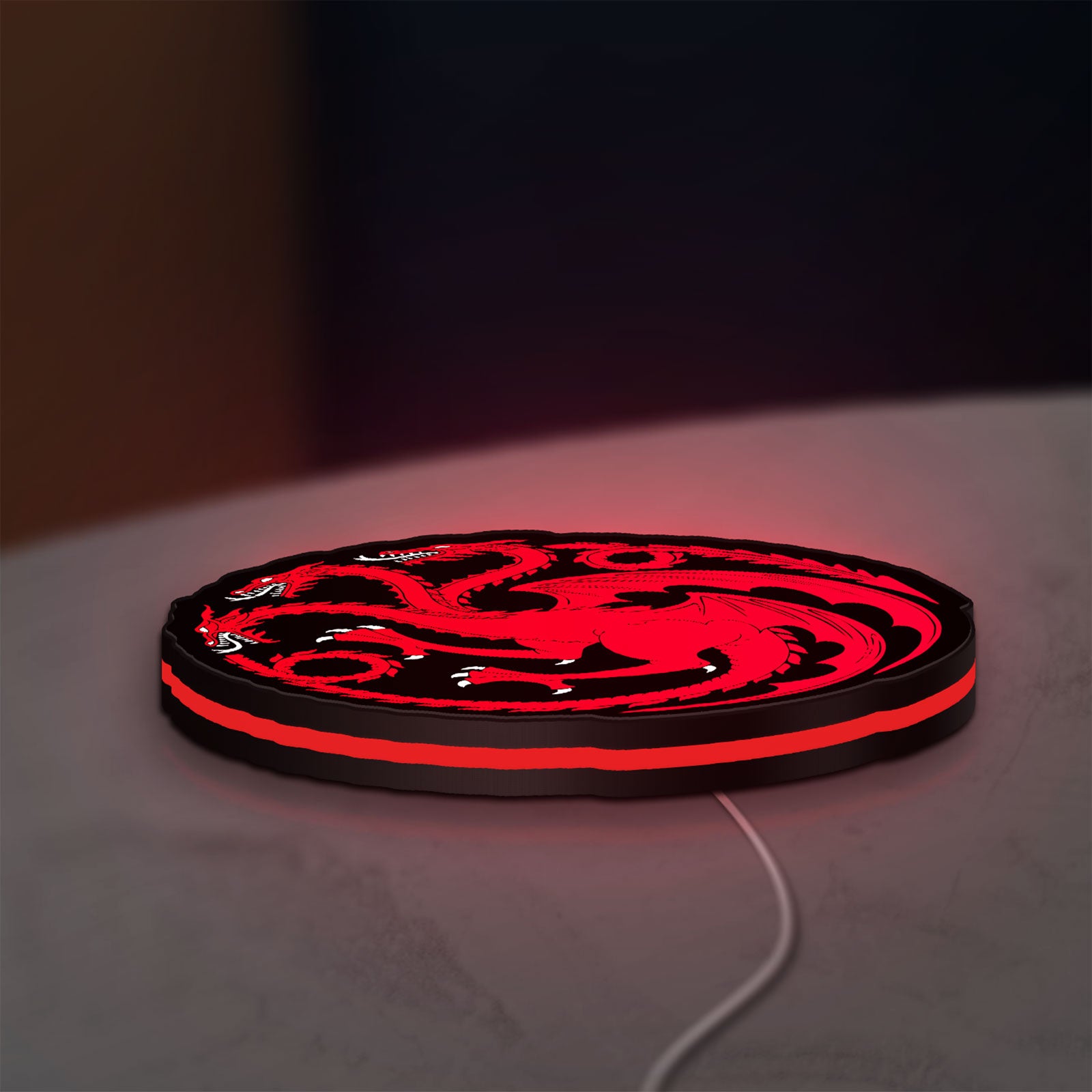 House Targaryen LED lightbox lying flat on a desk with red glow