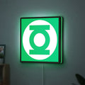 Green Lantern Corps LED lightbox hanging on a wall with green glow