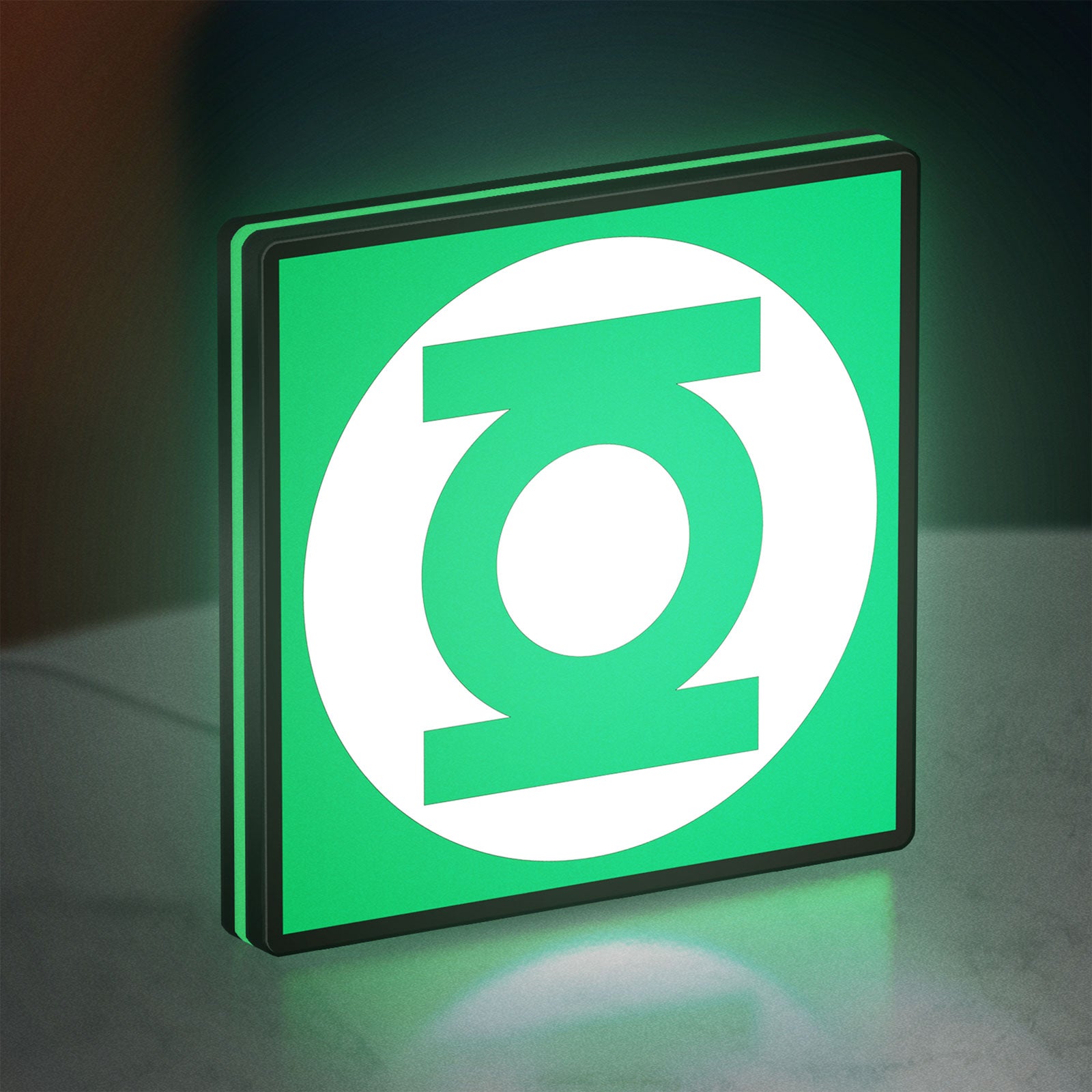 Green Lantern Corps LED lightbox standing on a desk from an angled side view with green glow