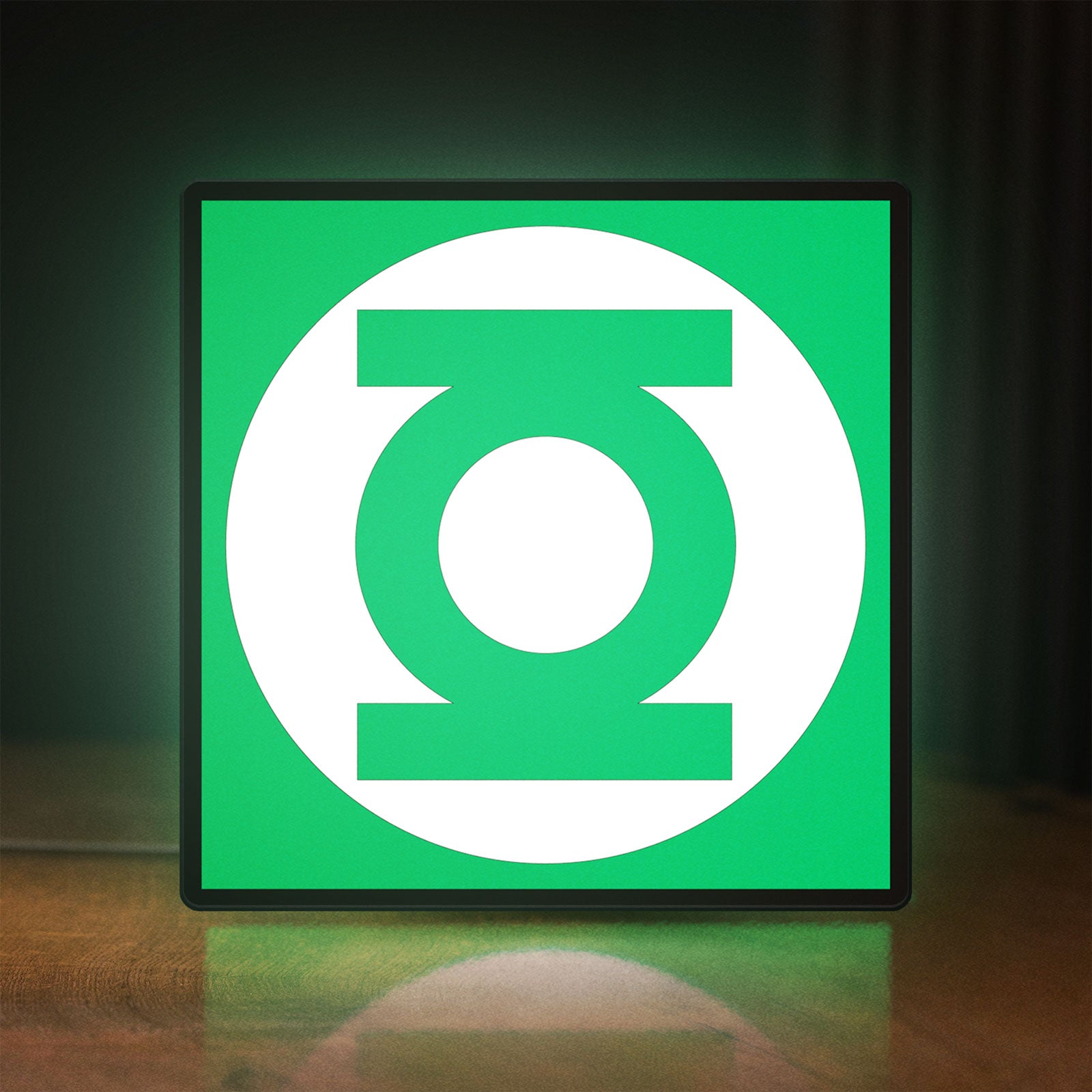 Front view of Green Lantern Corps LED lightbox sign glowing on a wooden desk