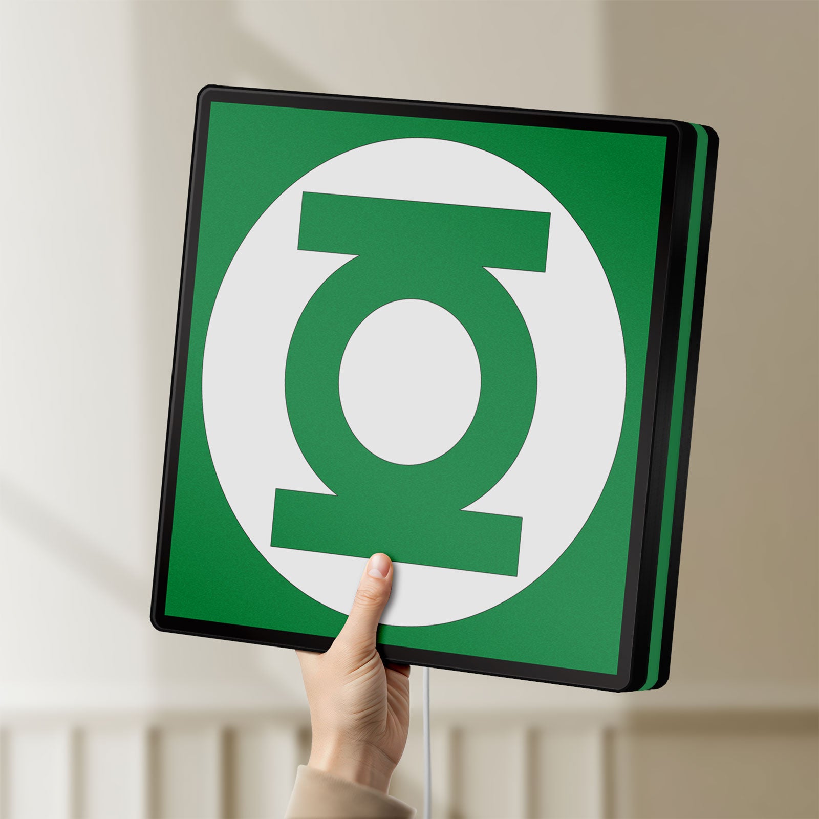Unlit Green Lantern Corps LED lightbox held by hand to show size and details