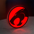 Thundercats 80s Retro LED lightbox standing on a desk from an angled side view with red glow