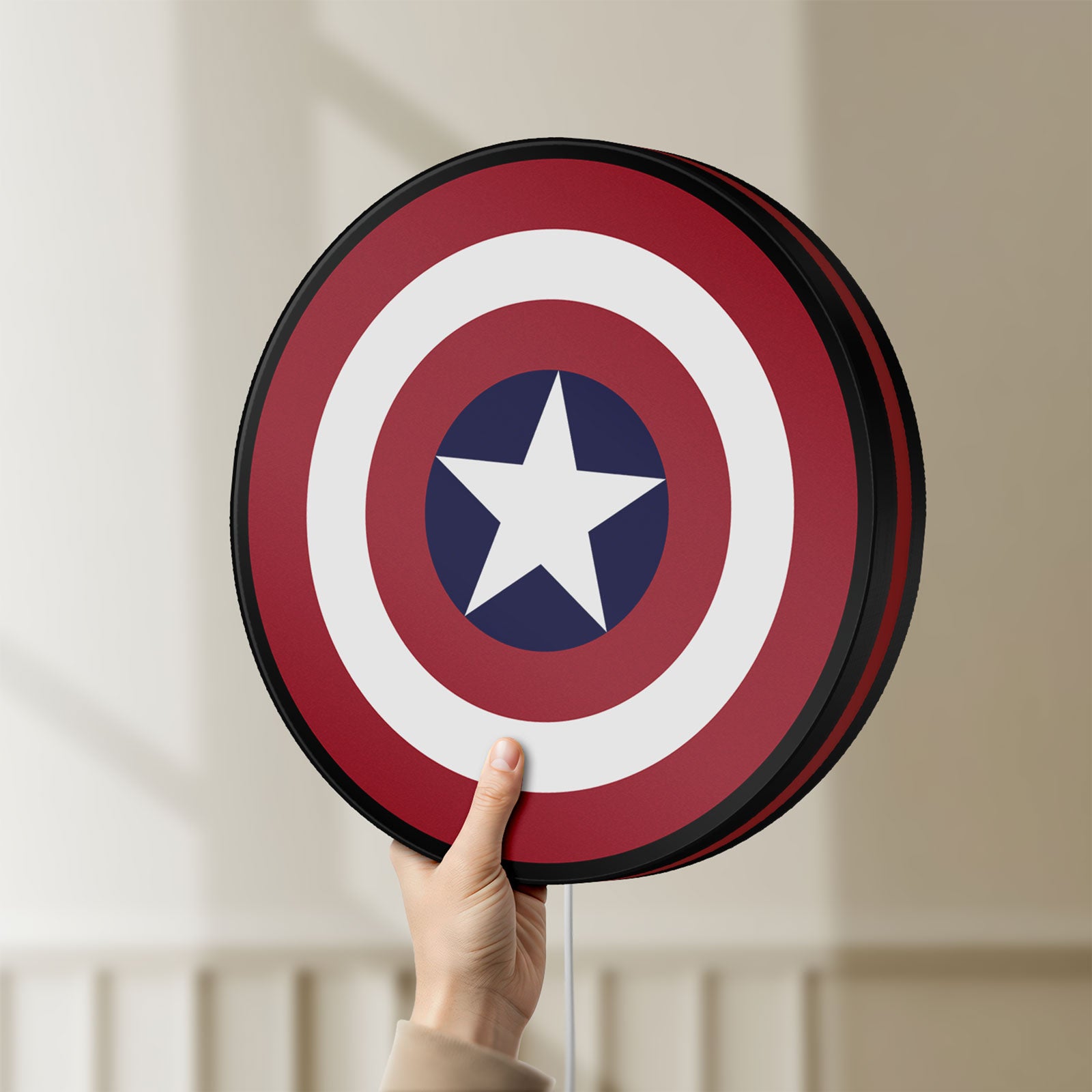 Unlit Captain America Shield LED lightbox held by hand to show size and details