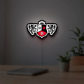 RBD LED lightbox hanging on a room wall with soft white light