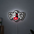 RBD LED lightbox hanging on a wall with white glow