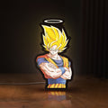 Front view of Dragon Ball Z Goku LED lightbox sign glowing on a wooden desk