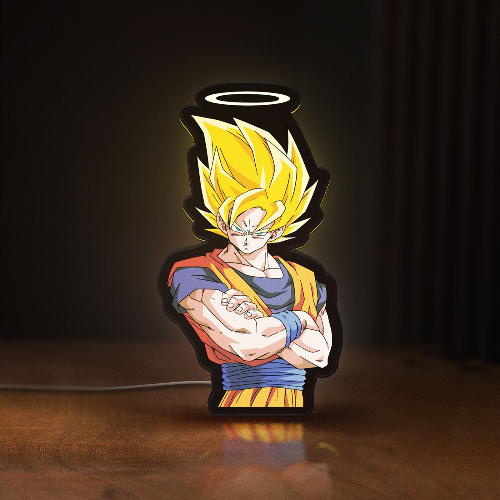 Front view of Dragon Ball Z Goku LED lightbox sign glowing on a wooden desk