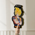 Unlit Dragon Ball Z Goku LED lightbox held by hand to show size and details