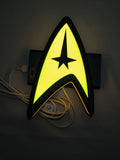 20cm Star Trek Command Insignia 3D Printed Sign - Illuminated flat lay front view, unique wall art for desk and room decor