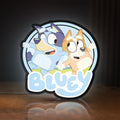 Front view of Bluey Inspired LED lightbox sign glowing on a wooden desk