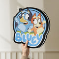 Unlit Bluey Inspired LED lightbox held by hand to show size and details