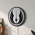 Unlit Star Wars LED lightbox mounted on a wall in daylight