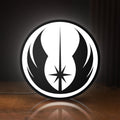 Front view of Star Wars LED lightbox sign glowing on a wooden desk