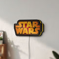 Unlit Star Wars LED lightbox mounted on a wall in daylight