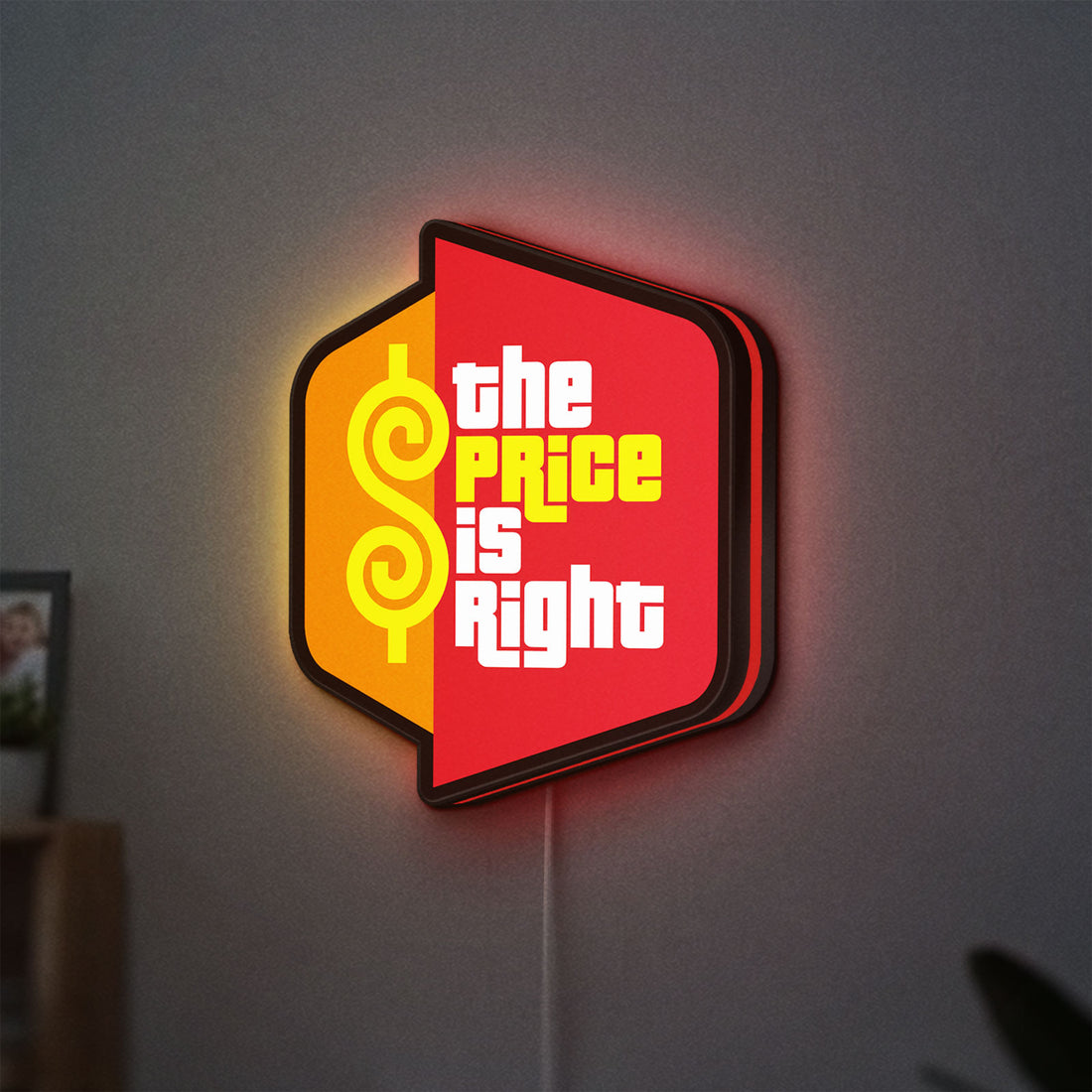 The Price is Right LED lightbox hanging on a wall with red glow