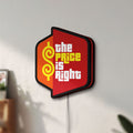 Unlit The Price is Right LED lightbox mounted on a wall in daylight