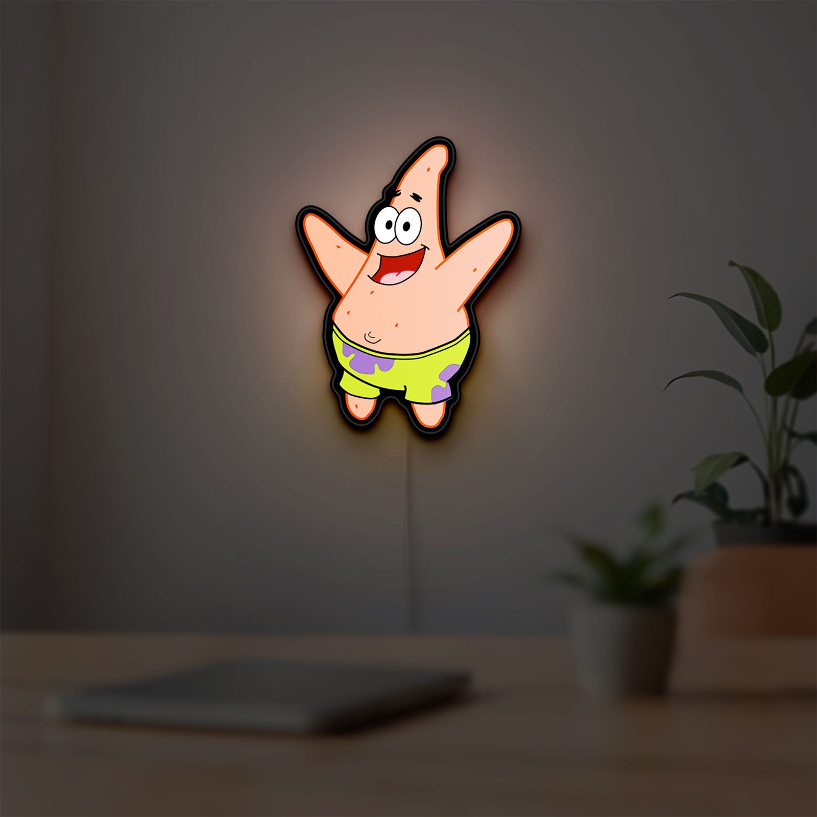 Patrick Star LED lightbox hanging on a room wall with soft white light