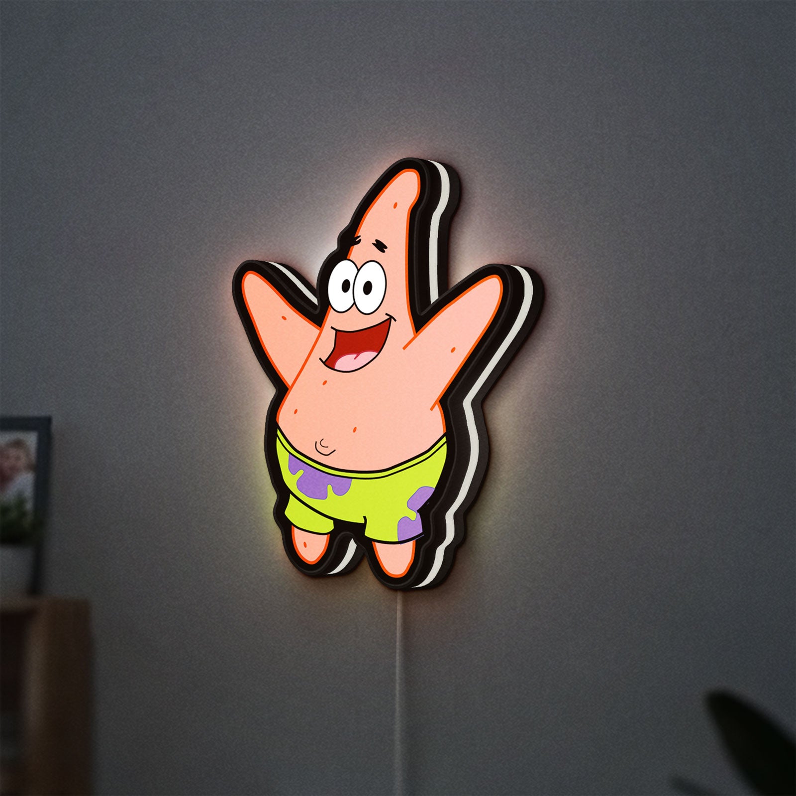 Patrick Star LED lightbox hanging on a wall with white glow