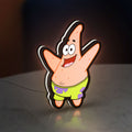 Patrick Star LED lightbox standing on a desk from an angled side view with white glow