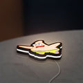 Patrick Star LED lightbox lying flat on a desk with white glow