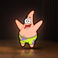 Front view of Patrick Star LED lightbox sign glowing on a wooden desk