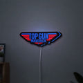 Top Gun Maverick LED lightbox hanging on a wall with blue glow