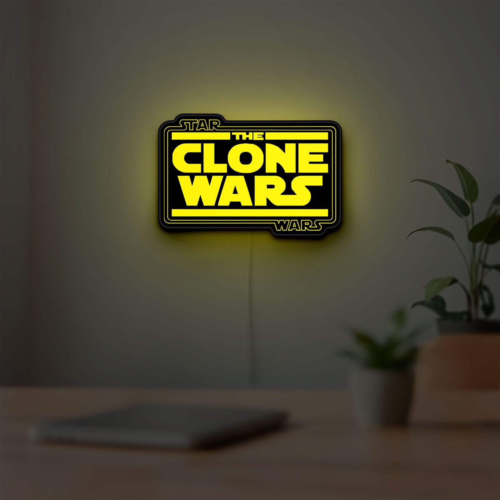 Clone Wars LED lightbox hanging on a room wall with soft yellow light