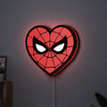Spiderman Heart LED lightbox hanging on a wall with red glow