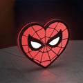 Spiderman Heart LED lightbox standing on a desk from an angled side view with red glow