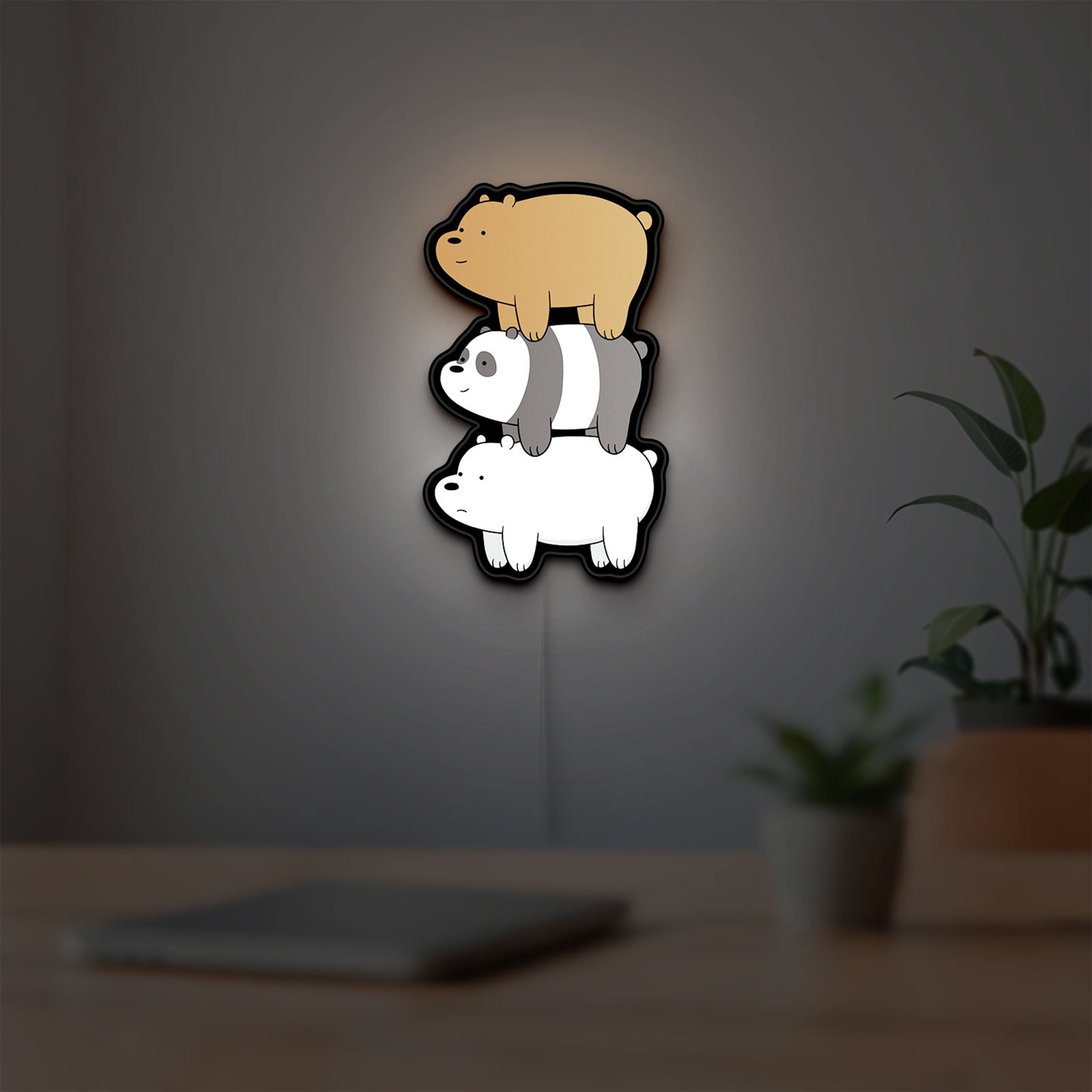 We Bare Bears Stacked Bears LED lightbox hanging on a room wall with soft white light