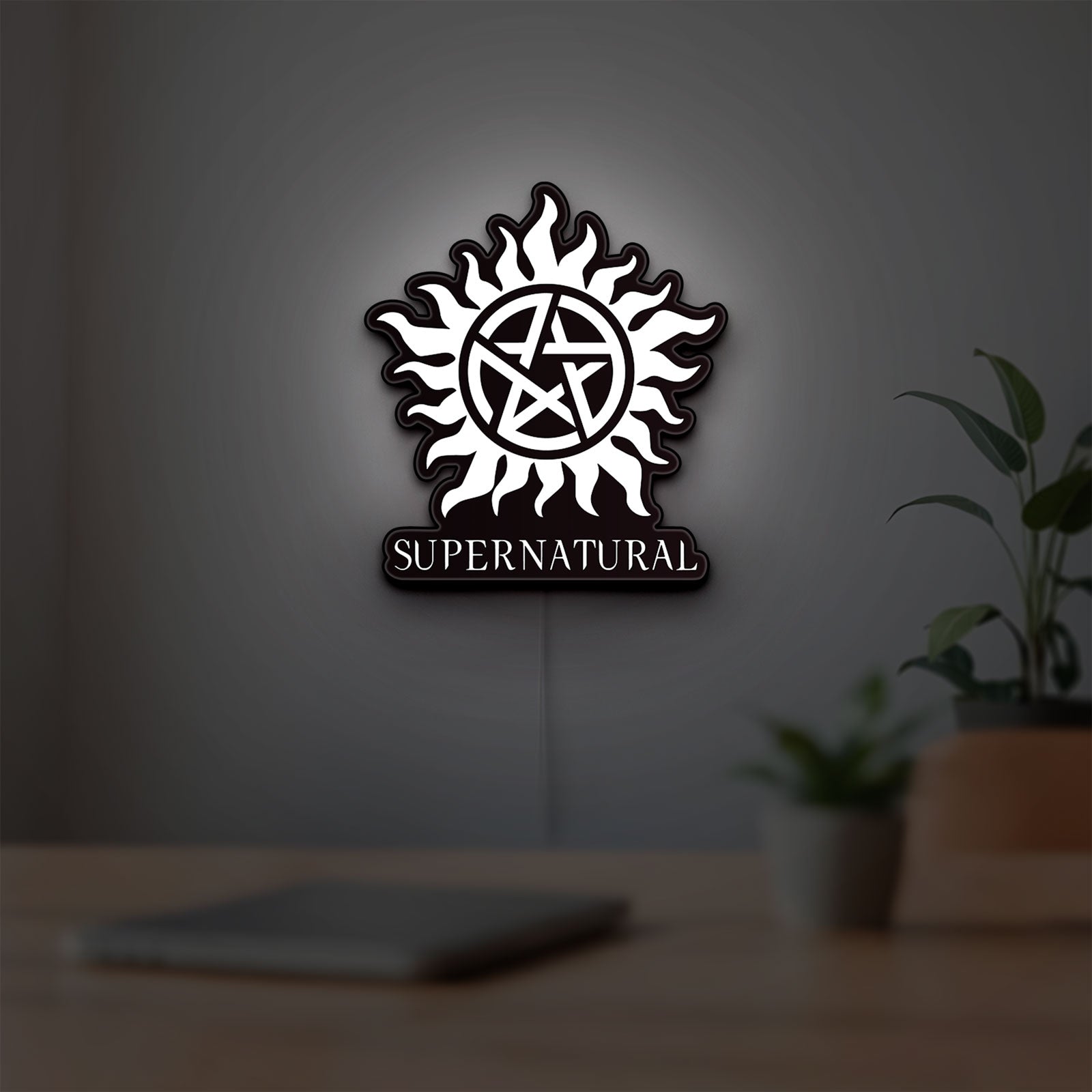 Supernatural LED lightbox hanging on a room wall with soft white light