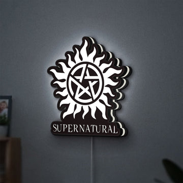 Supernatural LED lightbox hanging on a wall with white glow