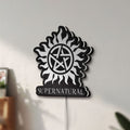 Unlit Supernatural LED lightbox mounted on a wall in daylight