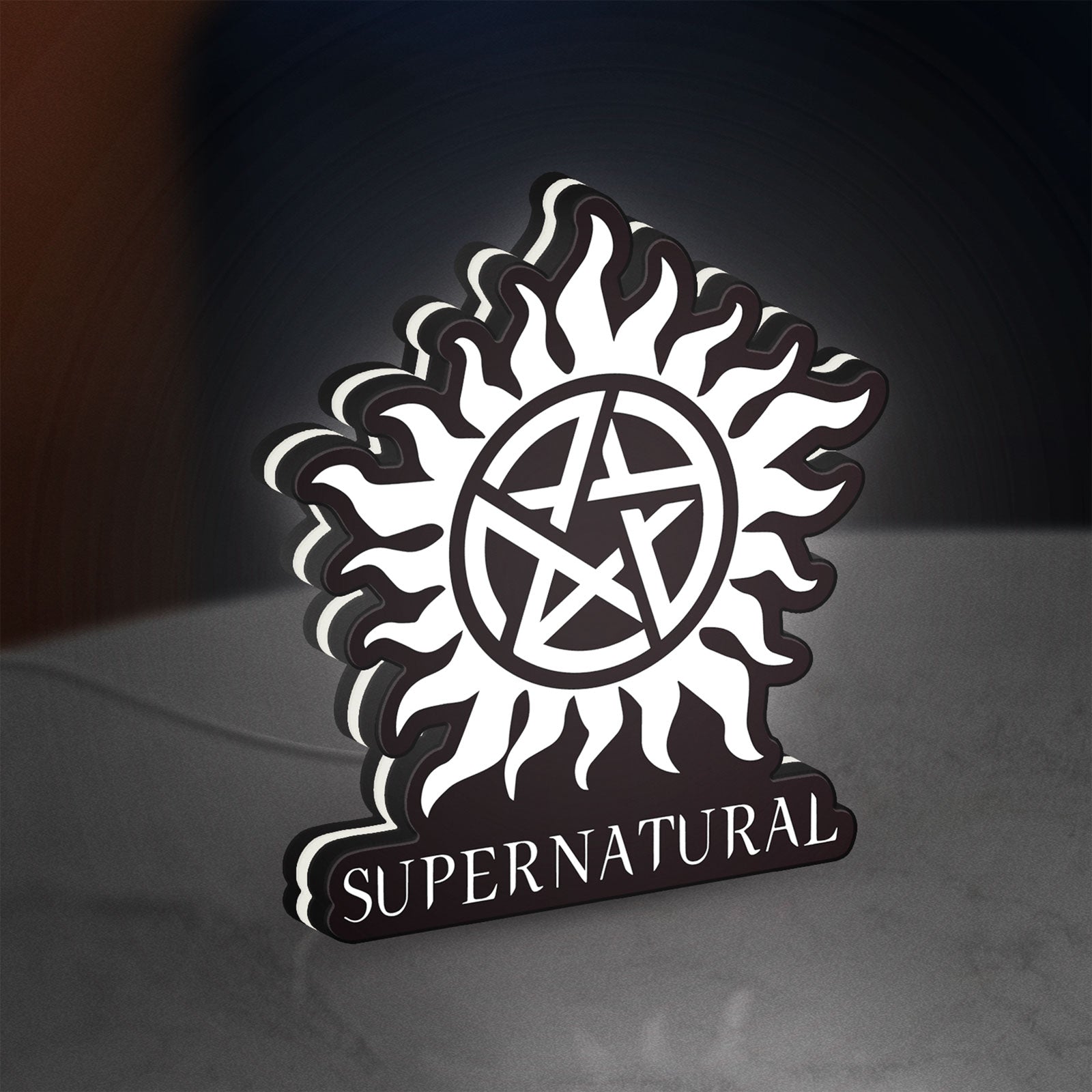 Supernatural LED lightbox standing on a desk from an angled side view with white glow