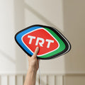 Unlit TRT LED lightbox held by hand to show size and details