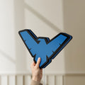 Unlit Nightwing LED lightbox held by hand to show size and details