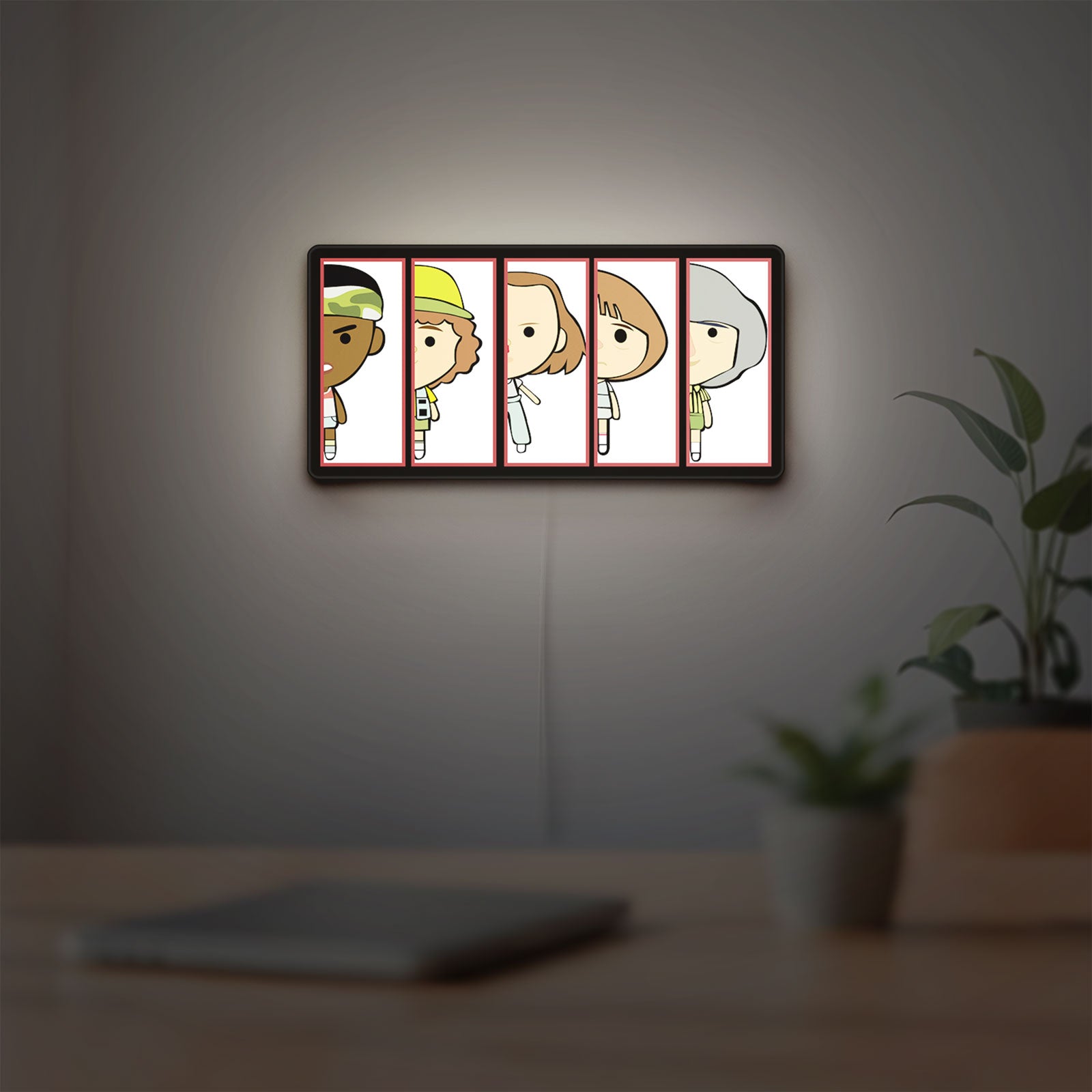 Stranger Things LED lightbox hanging on a room wall with soft white light