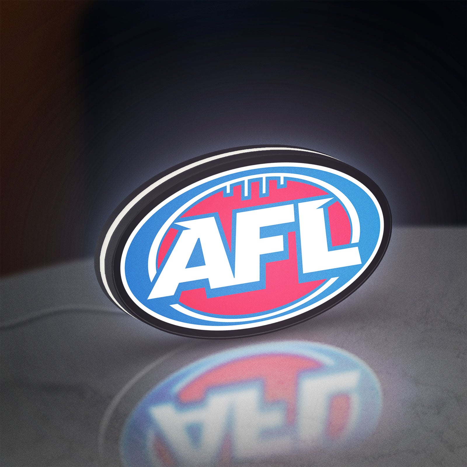 AFL LED lightbox standing on a desk from an angled side view with white glow
