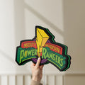 Unlit Mighty Morphin Power Rangers LED lightbox held by hand to show size and details