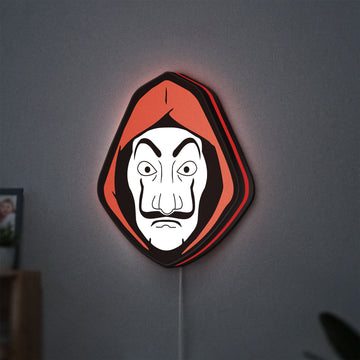La Casa De Papel LED lightbox hanging on a wall with red glow