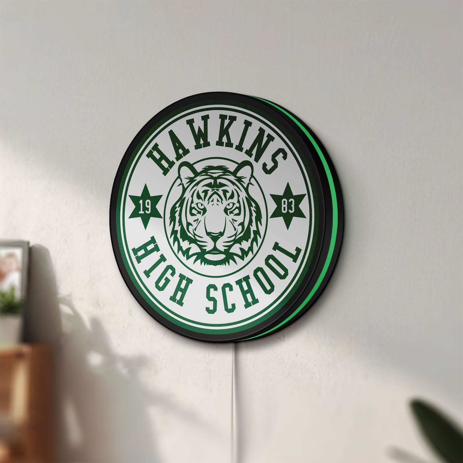 Unlit Hawkins Stranger Things LED lightbox mounted on a wall in daylight