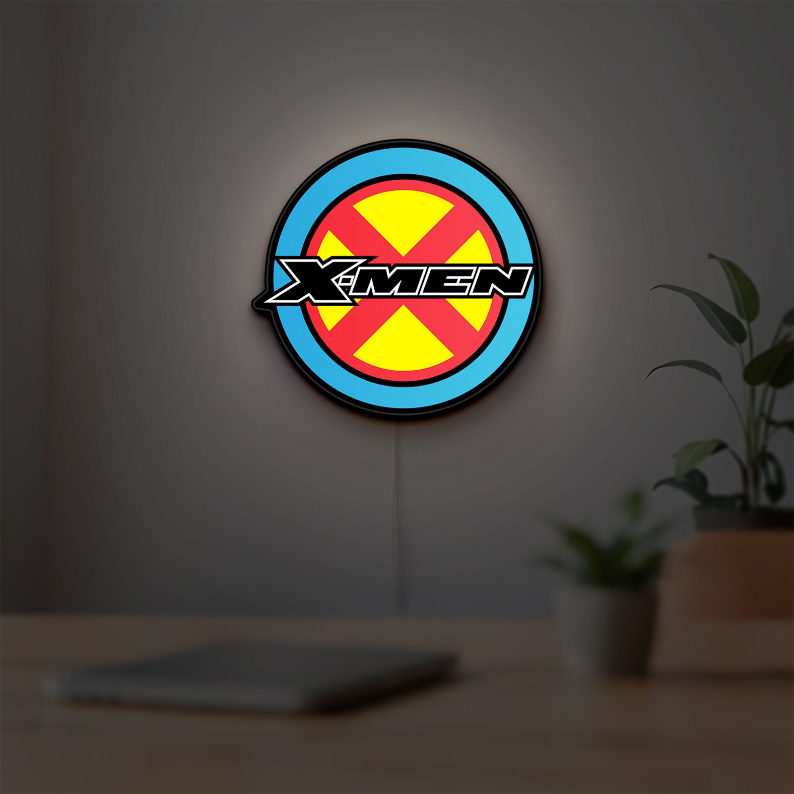 X-Men LED lightbox hanging on a room wall with soft blue light