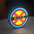 X-Men LED lightbox standing on a desk from an angled side view with blue glow