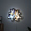 Bluey LED lightbox hanging on a wall with white glow