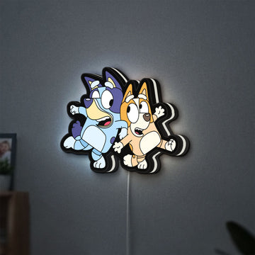 Bluey LED lightbox hanging on a wall with white glow