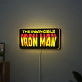 Iron Man Comic Style LED lightbox hanging on a wall with yellow glow